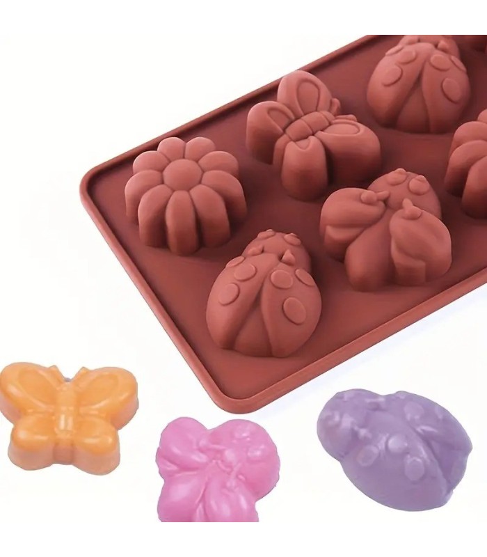 MOLDE DE SILICONA 8 MOLDE SURTIDO 21x11CM