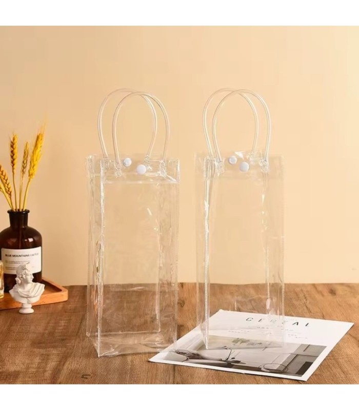 BOLSO TRANSPARENTE CON BOTON 25x10x10CM