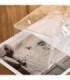 BOLSO TRANSPARENTE CON BOTON 25x10x10CM