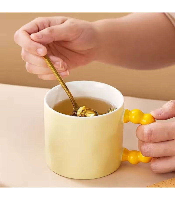 TAZA DE CERAMICA CON MANIJA DE PERLA