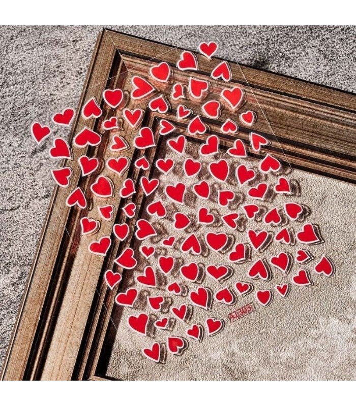 Sticker de corazon rojo borde blanco