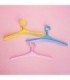 Percha plastico giratorio